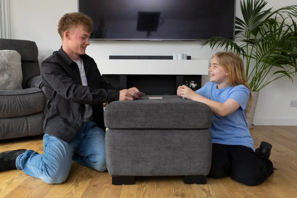 FosteringNorthSomerset_foster-children-in-lounge-playing